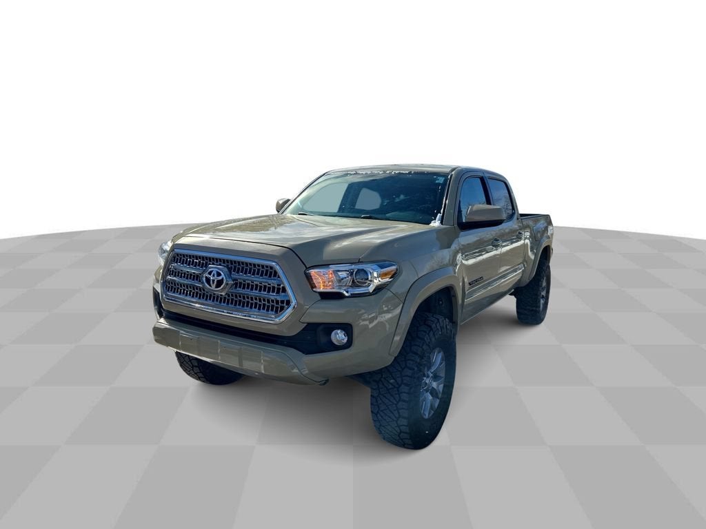2016 Toyota Tacoma SR5 in Quicksand — front three-quarter view