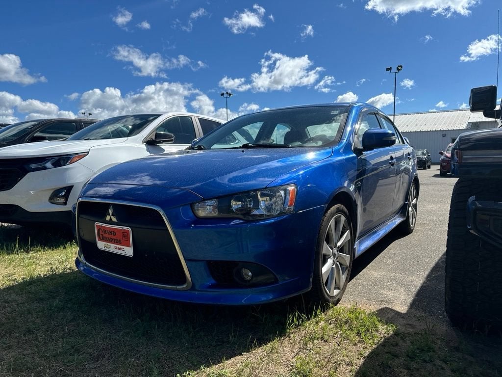 2015 Mitsubishi Lancer Base in Blue — front three-quarter view